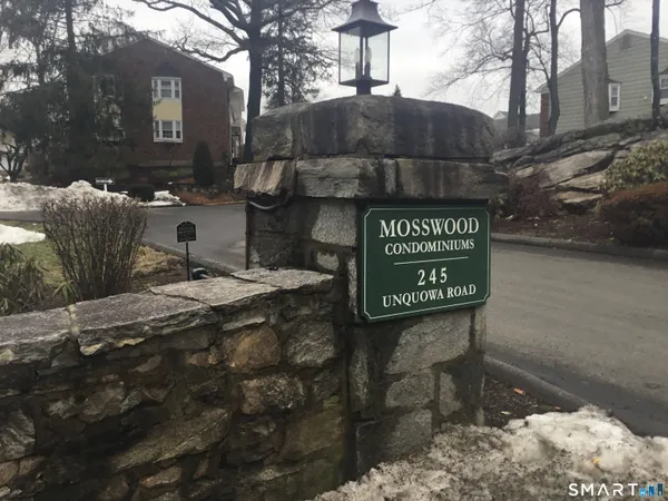 a sign on the side of a road