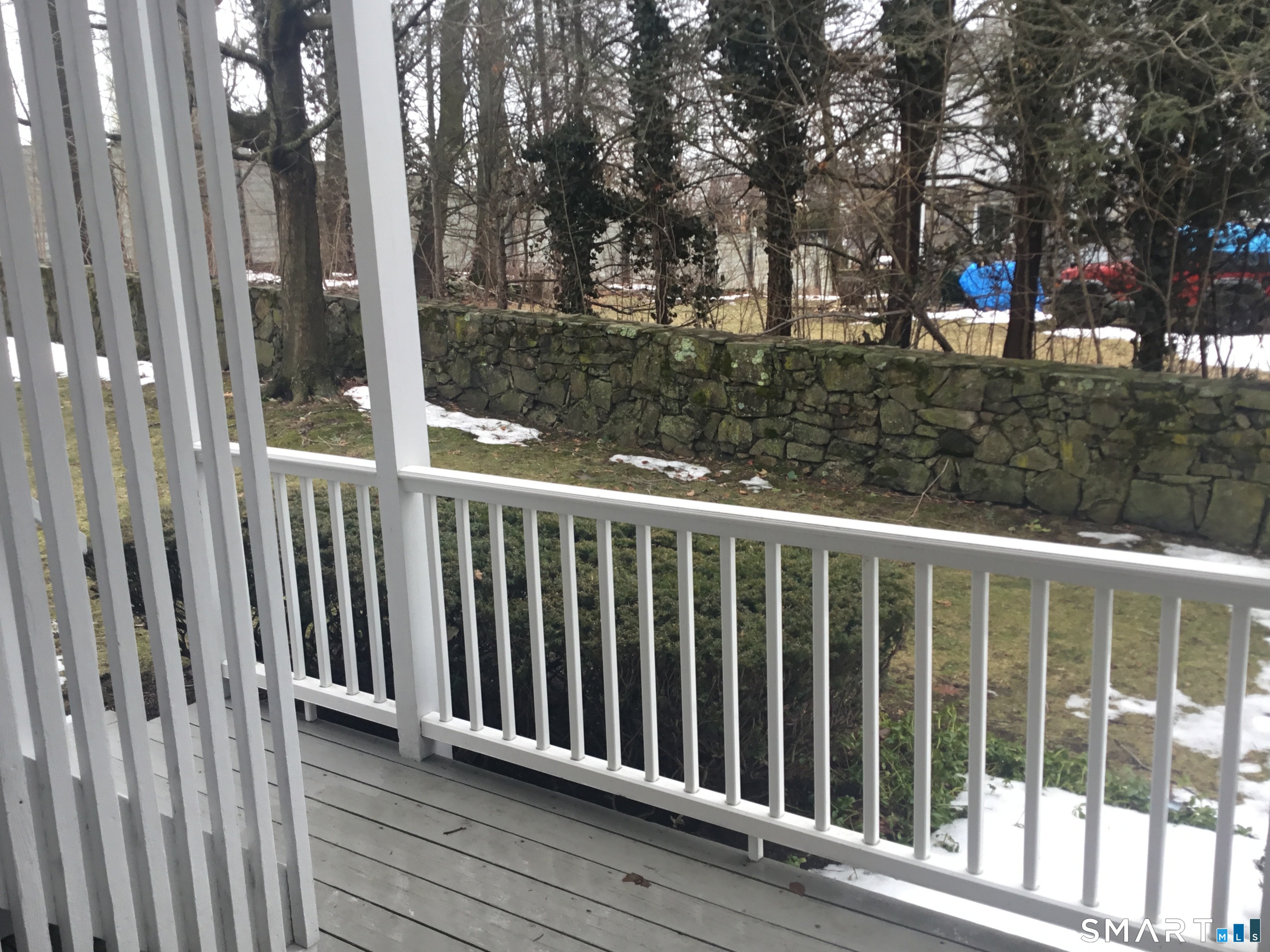 245 Unquowa Road, Unit 93 Fairfield, CT 06824 - Photo 11 of 11 a view of a wooden fence