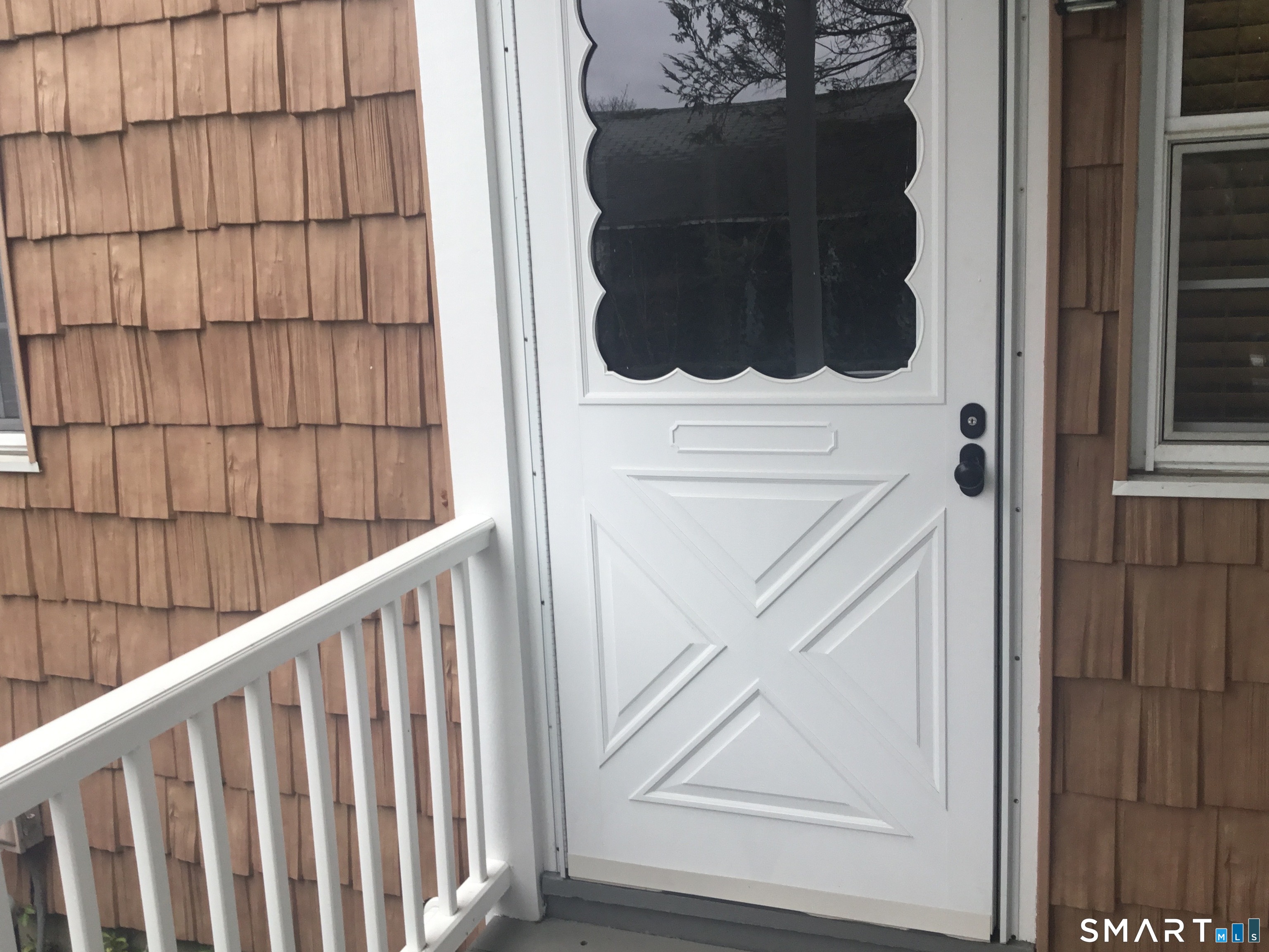 245 Unquowa Road, Unit 93 Fairfield, CT 06824 - Photo 10 of 11 a view of front door