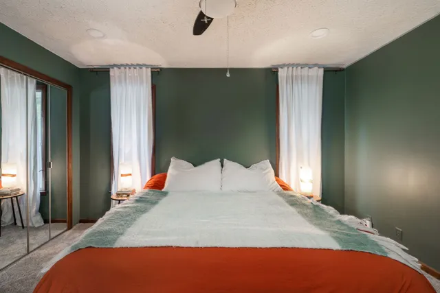 a view of a swimming pool with a deck