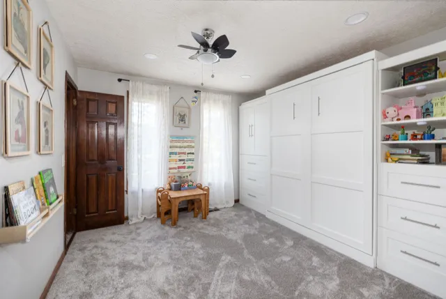 a view of living room and deck with furniture