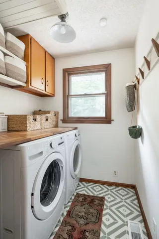 an aerial view of a pool yard and mountain view in back