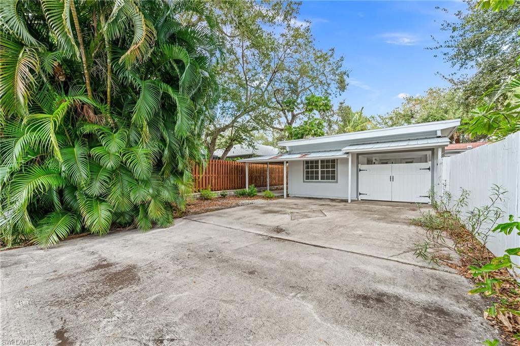 2472 Harbor Road Naples, FL 34104 - Photo 4 of 29 Back of house entrance /Gated Back Yard