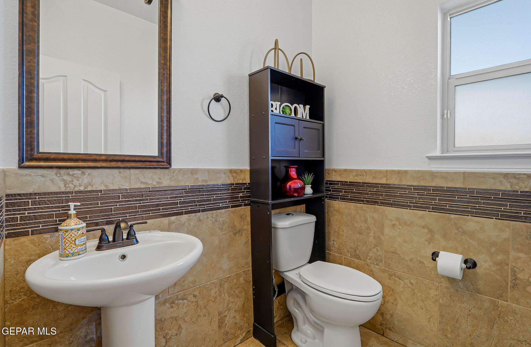 520 Gomez Road El Paso, TX 79932 - Photo 29 of 72 a bathroom with a sink and a toilet