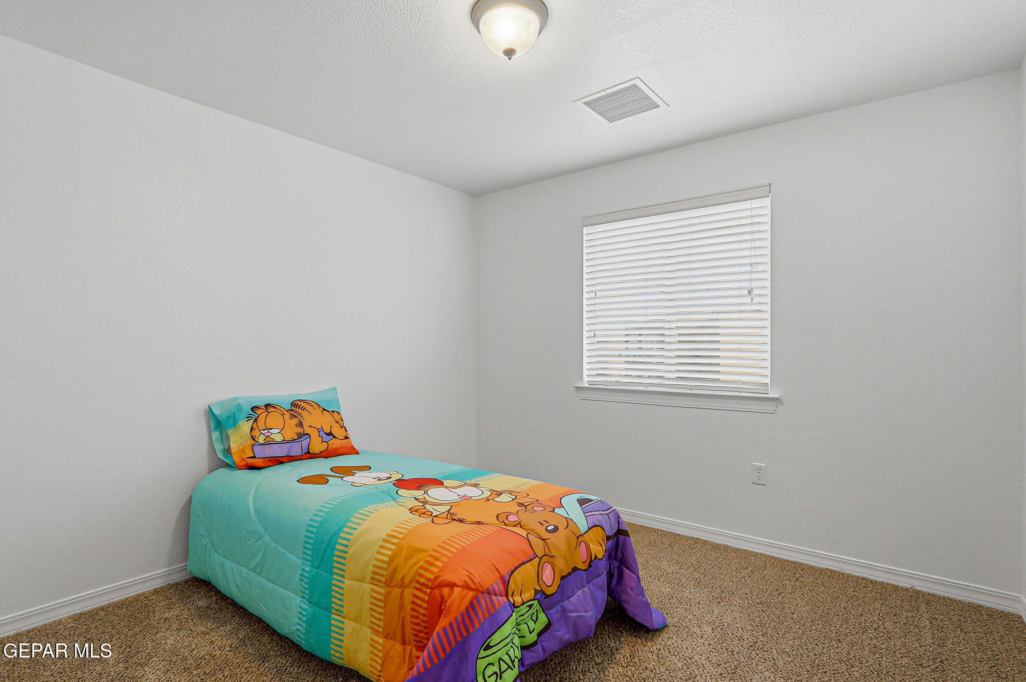 520 Gomez Road El Paso, TX 79932 - Photo 37 of 72 a bedroom with a bed and a window