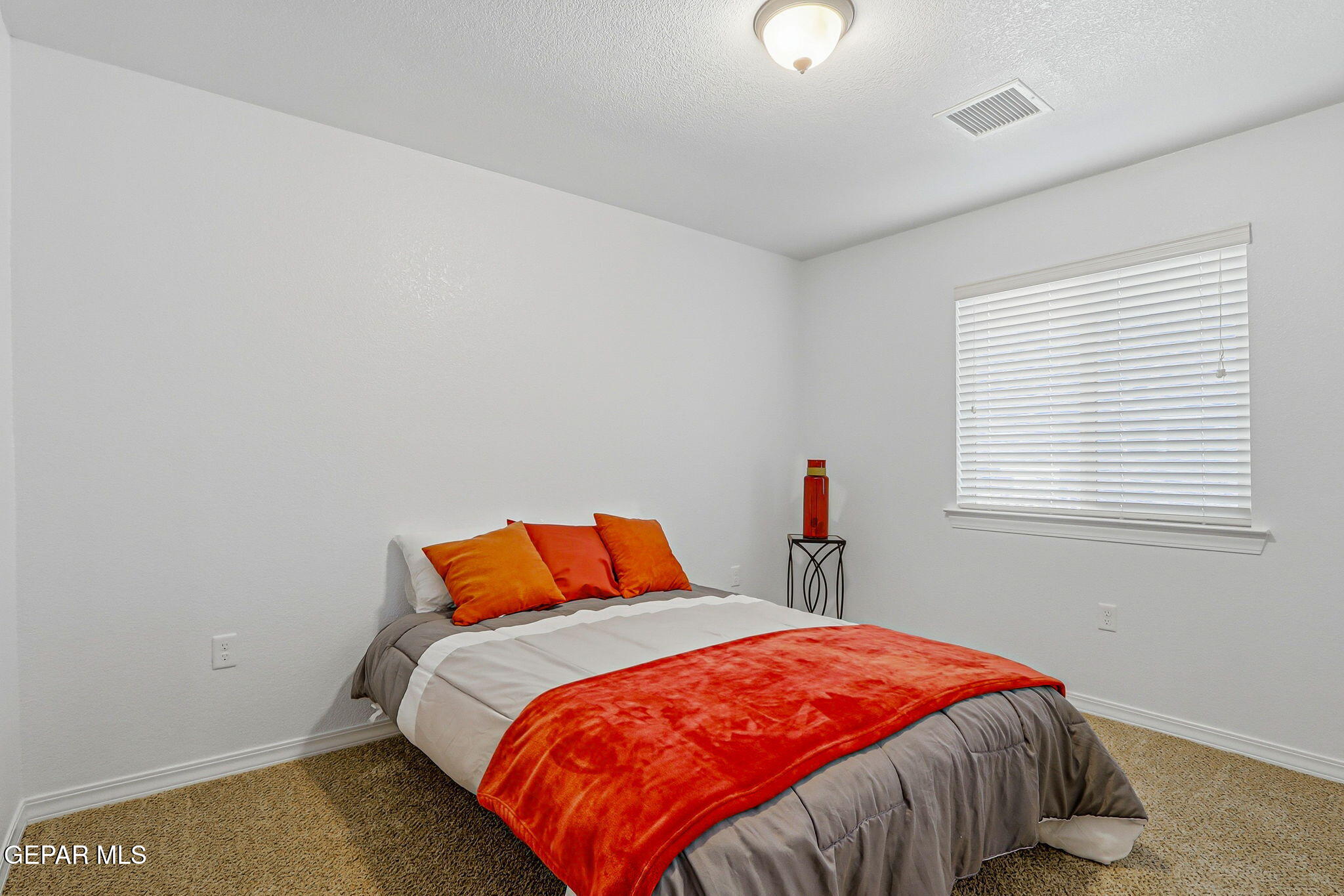 520 Gomez Road El Paso, TX 79932 - Photo 40 of 72 a bedroom with a bed and a window