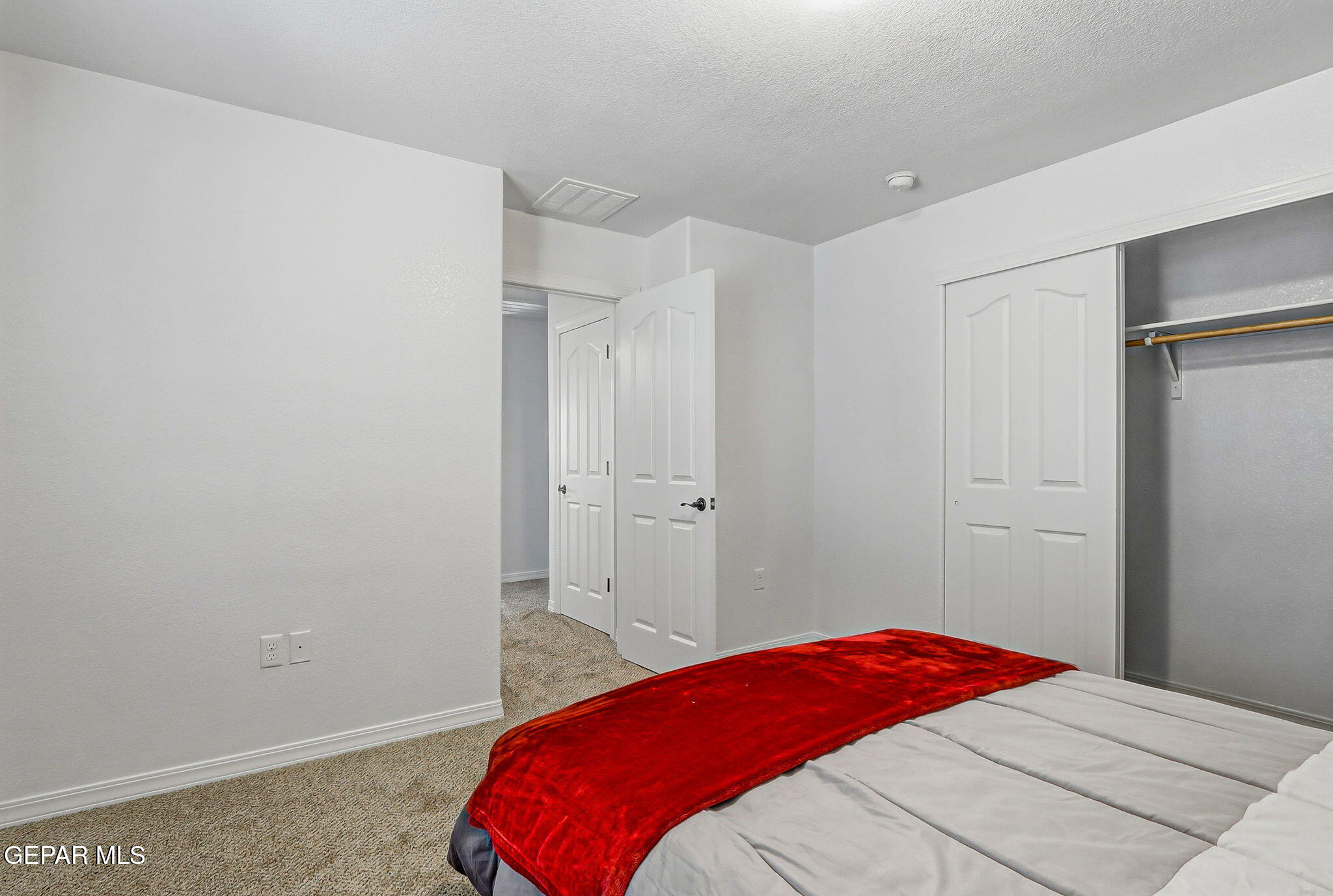 520 Gomez Road El Paso, TX 79932 - Photo 42 of 72 a bedroom with a bed and a closet