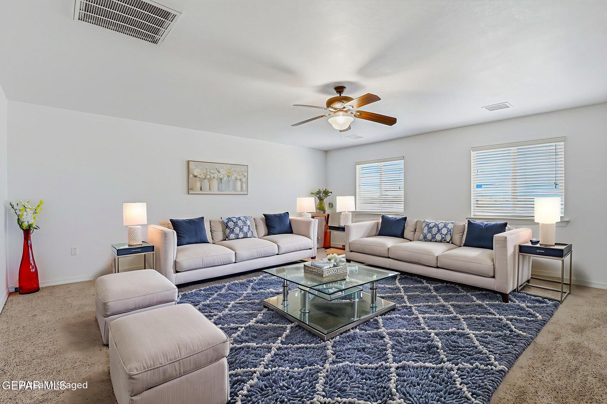 520 Gomez Road El Paso, TX 79932 - Photo 44 of 72 a living room with furniture a rug and a window