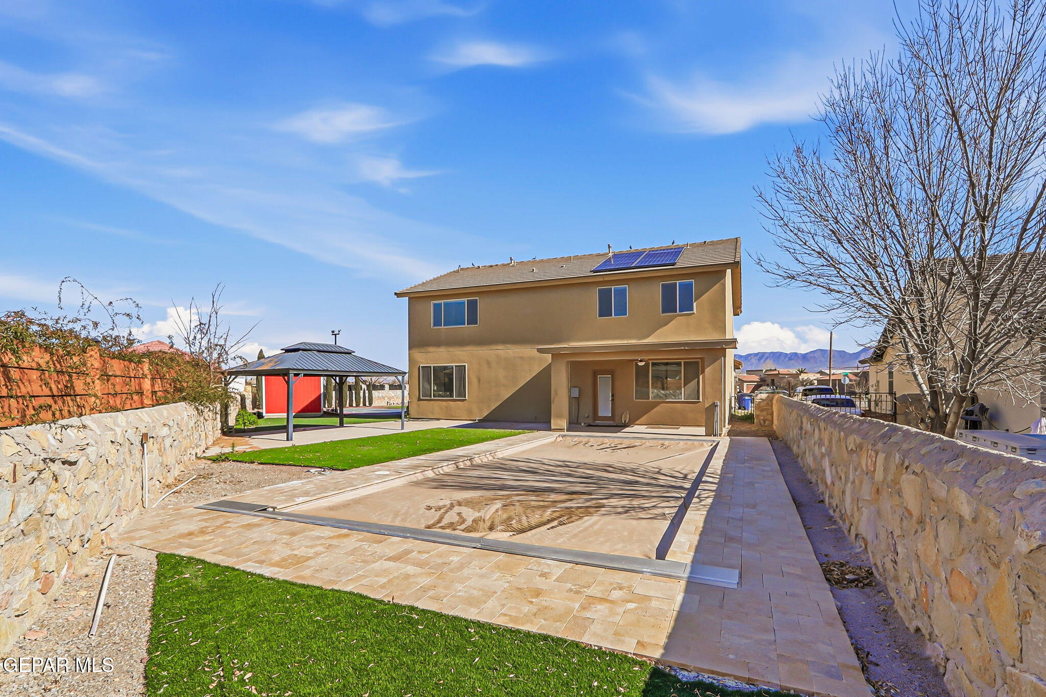 520 Gomez Road El Paso, TX 79932 - Photo 60 of 72 a front view of a house with a yard