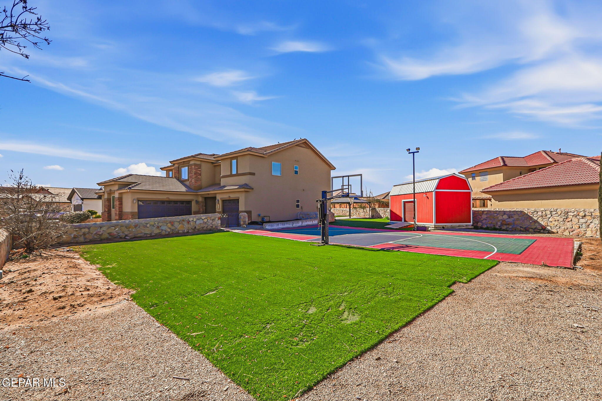 520 Gomez Road El Paso, TX 79932 - Photo 66 of 72 a front view of a house with swimming pool and yard