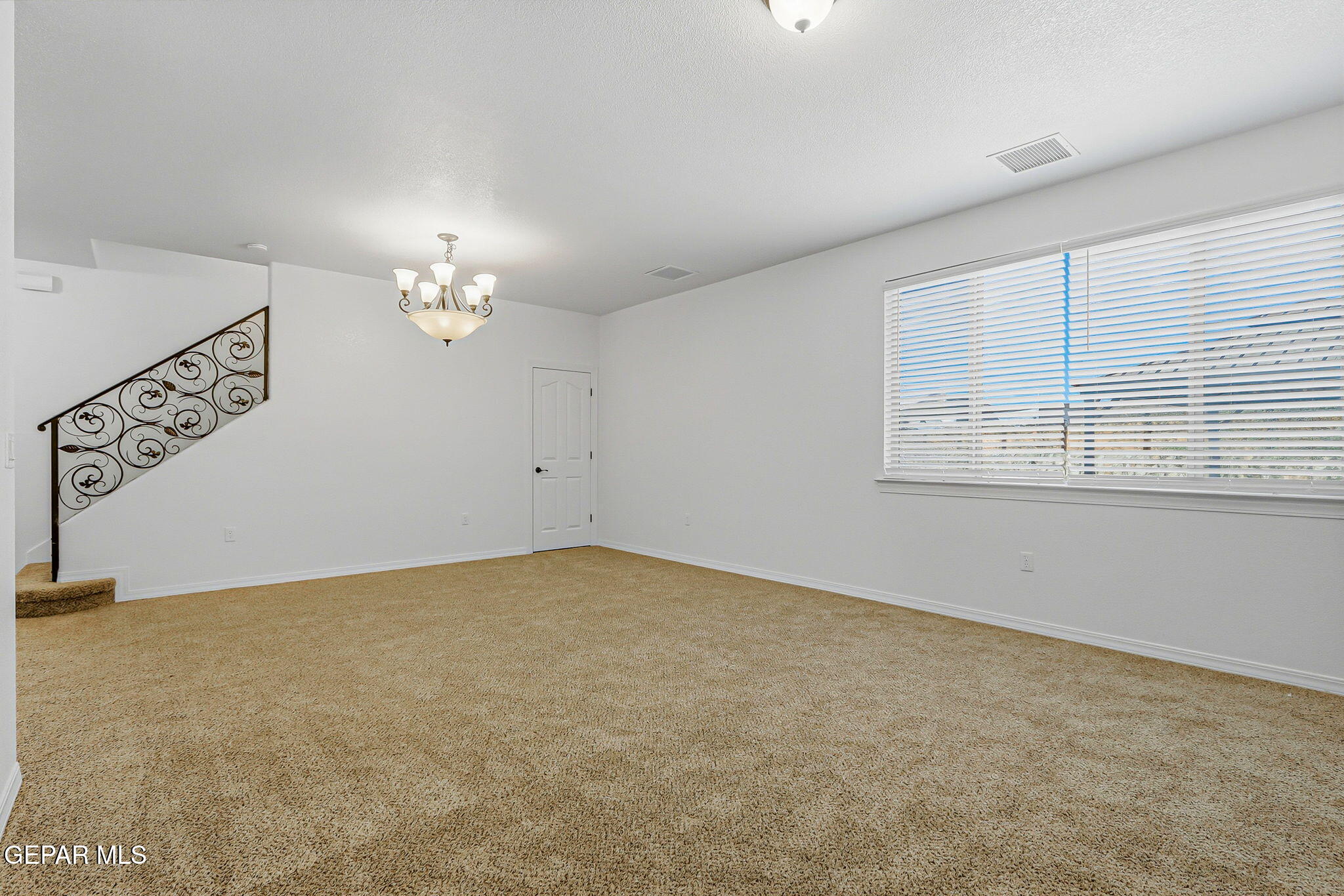 520 Gomez Road El Paso, TX 79932 - Photo 8 of 72 a view of an empty room with a window