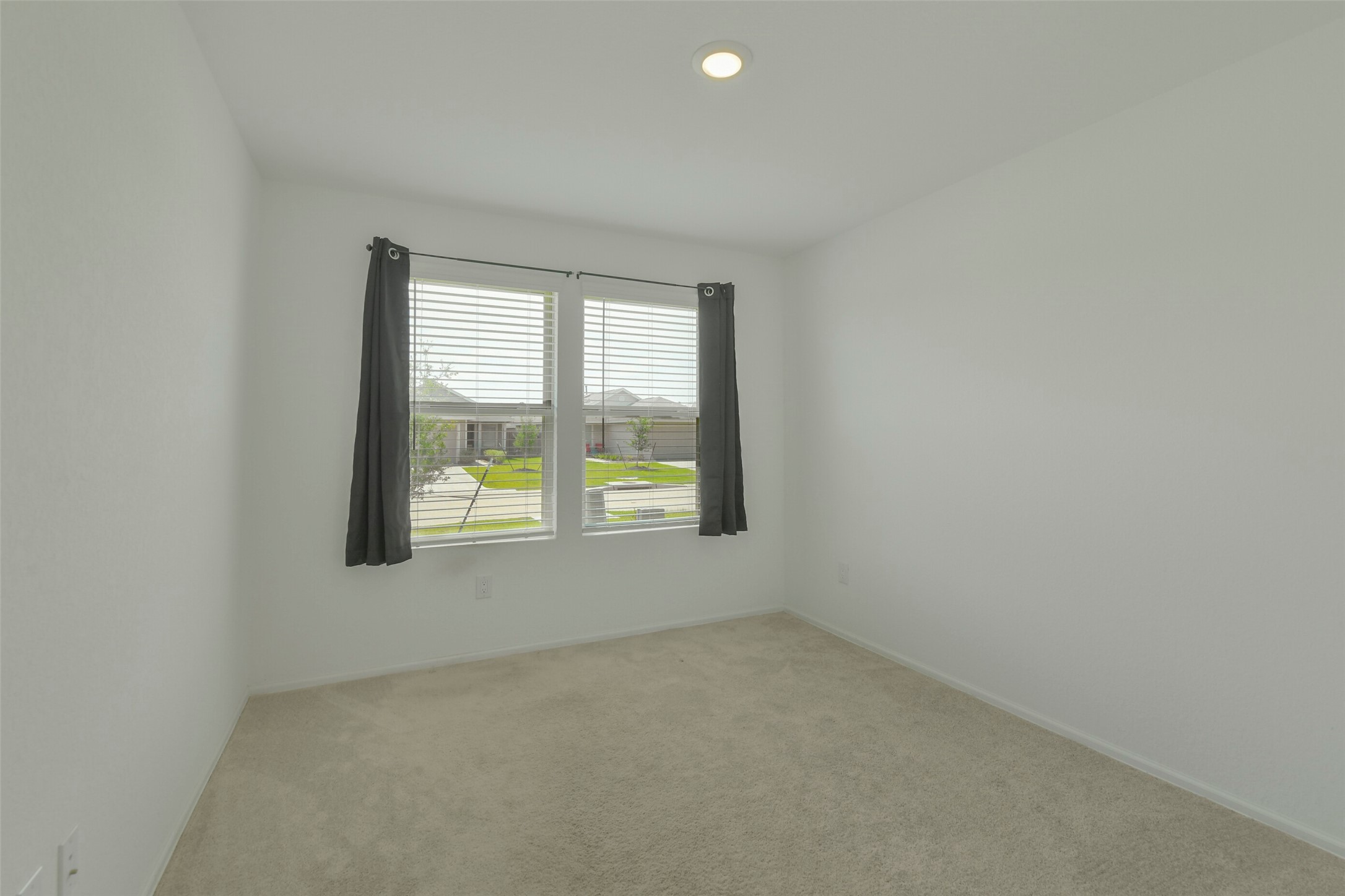 13978 Manatee Street Splendora, TX 77372 - Photo 10 of 39 Comfortable secondary bedroom with closet and natural light.