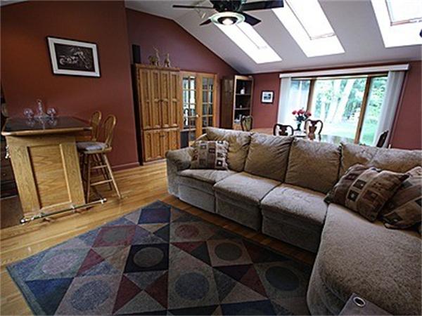 43 Little Farms Road Framingham, MA 01701 - Photo 8 of 20 a living room with furniture and a flat screen tv