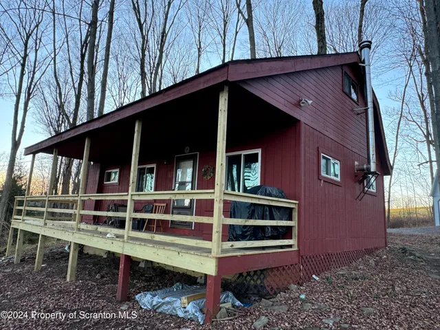 a front view of a house with balcony