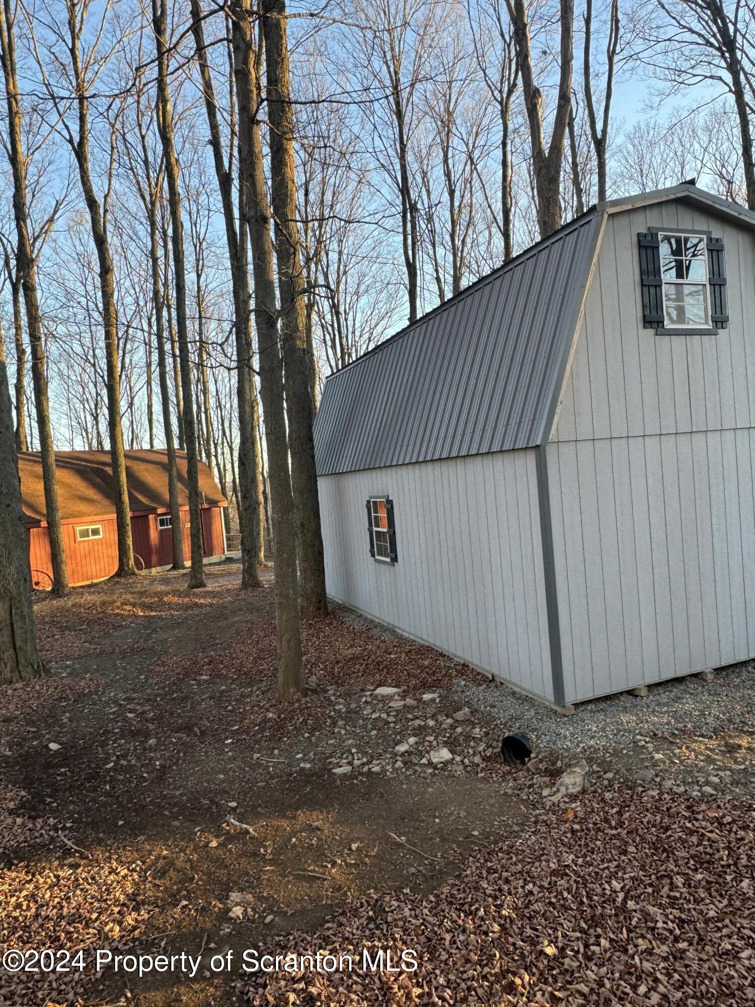 18285 Pa-92 Jackson, PA 18825 - Photo 12 of 49 a view of backyard and tree