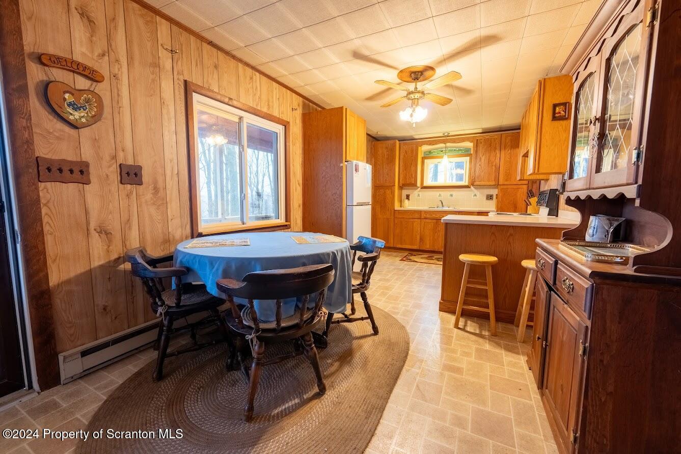 18285 Pa-92 Jackson, PA 18825 - Photo 19 of 49 a view of a dining room with furniture and window