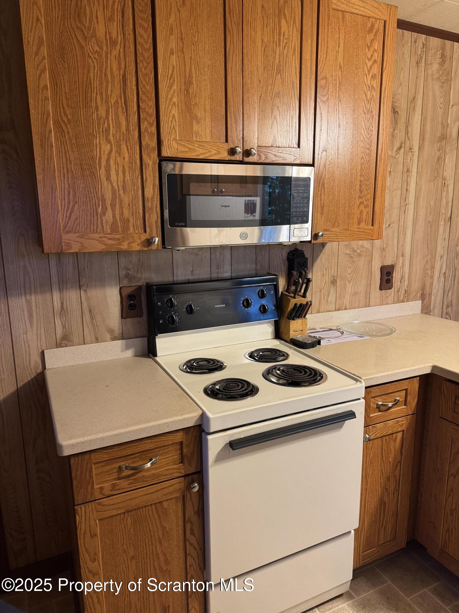 18285 Pa-92 Jackson, PA 18825 - Photo 22 of 49 a kitchen with a stove and a microwave