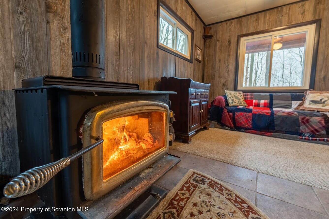 18285 Pa-92 Jackson, PA 18825 - Photo 26 of 49 a living room with furniture and a window
