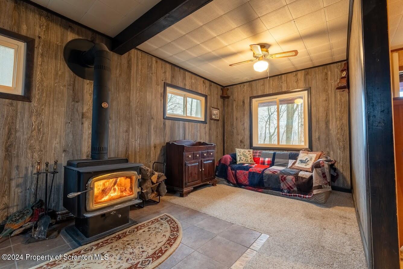 18285 Pa-92 Jackson, PA 18825 - Photo 29 of 49 a living room with furniture and a flat screen tv
