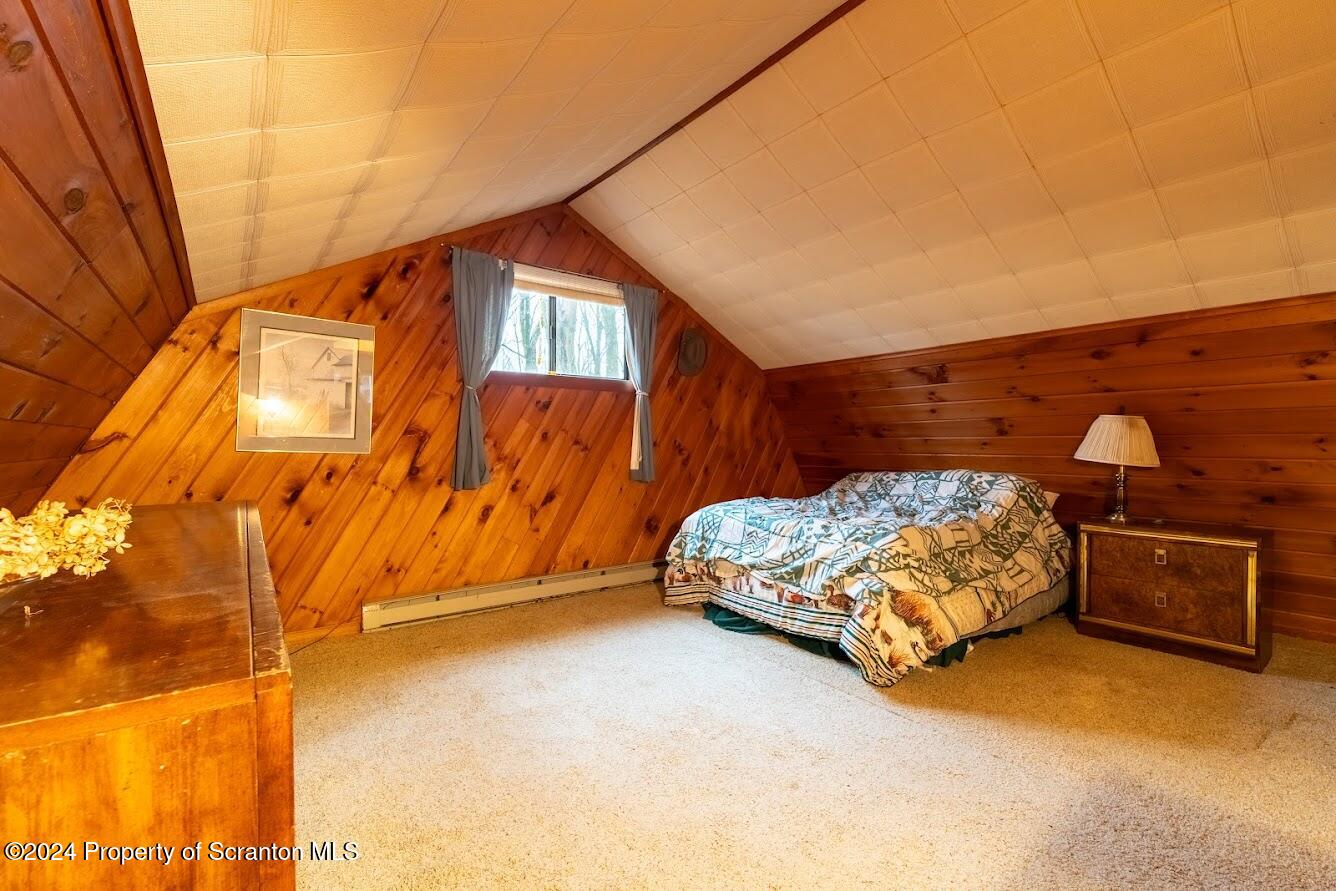 18285 Pa-92 Jackson, PA 18825 - Photo 33 of 49 a bedroom with a bed and a night stand