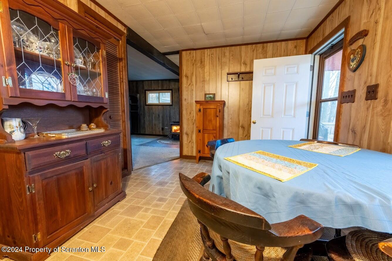 18285 Pa-92 Jackson, PA 18825 - Photo 35 of 49 a dining room with a table and chairs