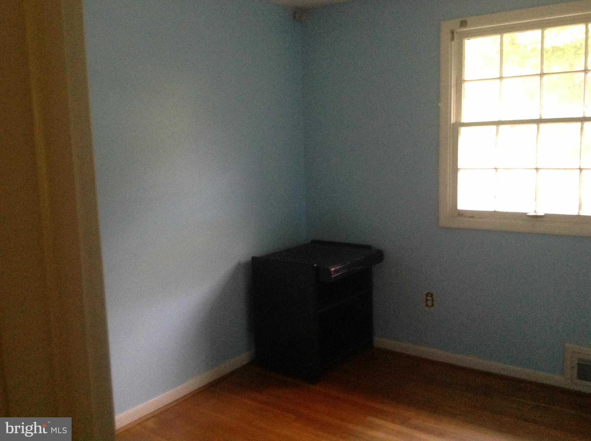 12701 Barbara Road Silver Spring, MD 20906 - Photo 14 of 21 an empty room with a window