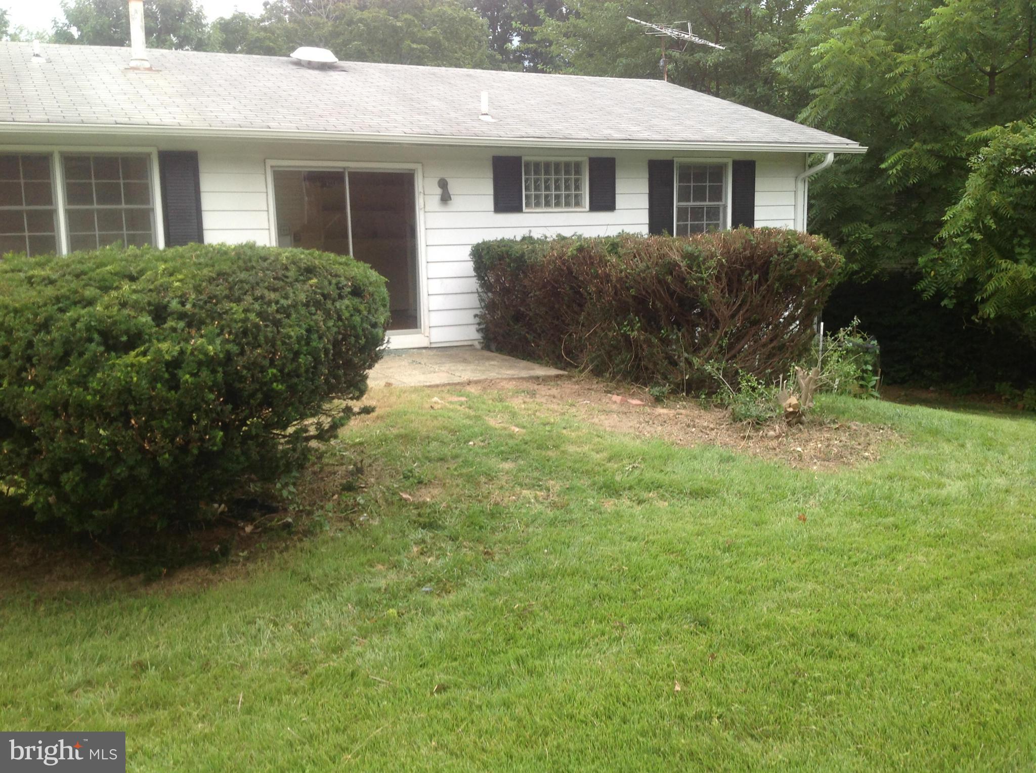 12701 Barbara Road Silver Spring, MD 20906 - Photo 20 of 21 a front view of a house with a yard