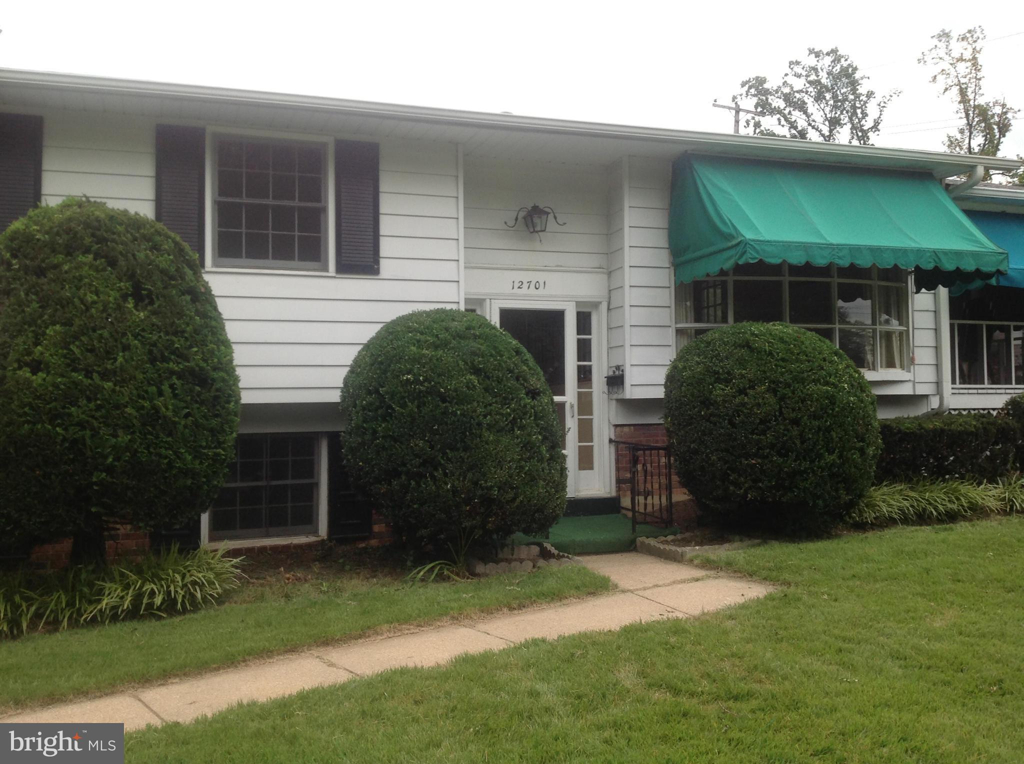 12701 Barbara Road Silver Spring, MD 20906 - Photo 4 of 21 a view of a house with a yard and plants