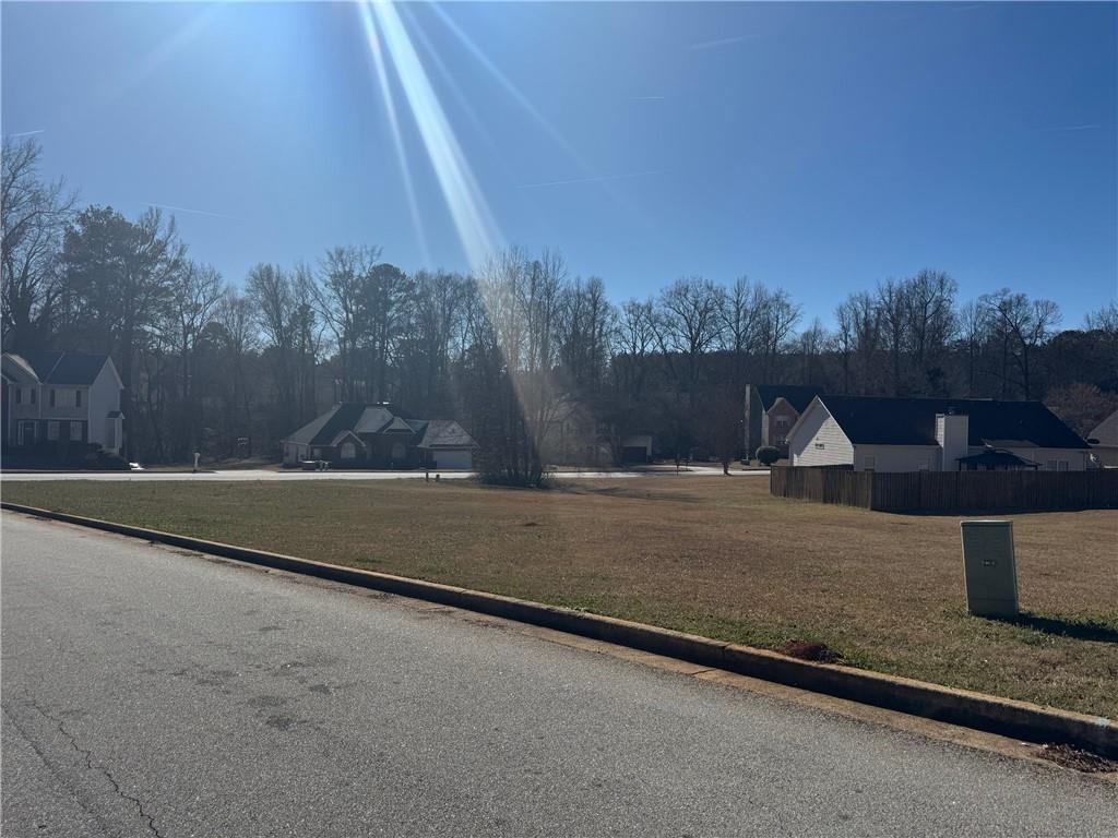 245 Camerons Way Covington, GA 30016 - Photo 2 of 10 a view of a backyard