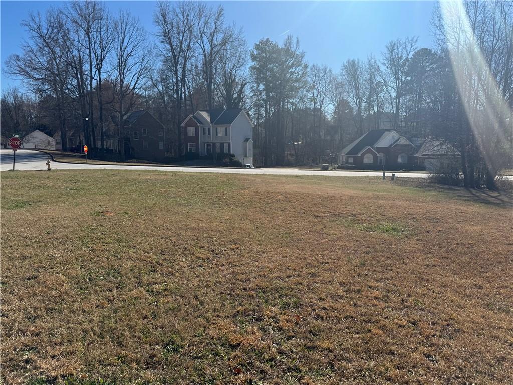 245 Camerons Way Covington, GA 30016 - Photo 4 of 10 a view of a yard