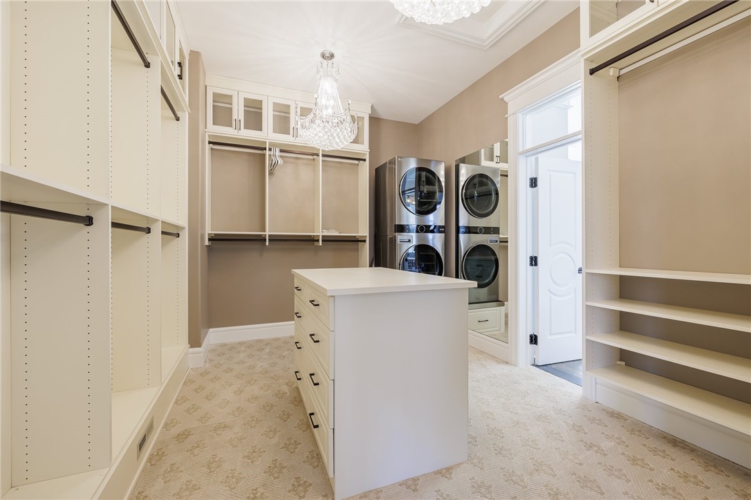 825 Victor Road Perinton, NY 14564 - Photo 28 of 50 Primary suite walk-in closet with laundry