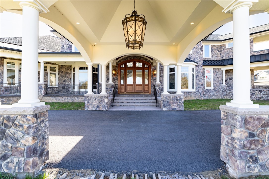 825 Victor Road Perinton, NY 14564 - Photo 3 of 50 Driveway portico