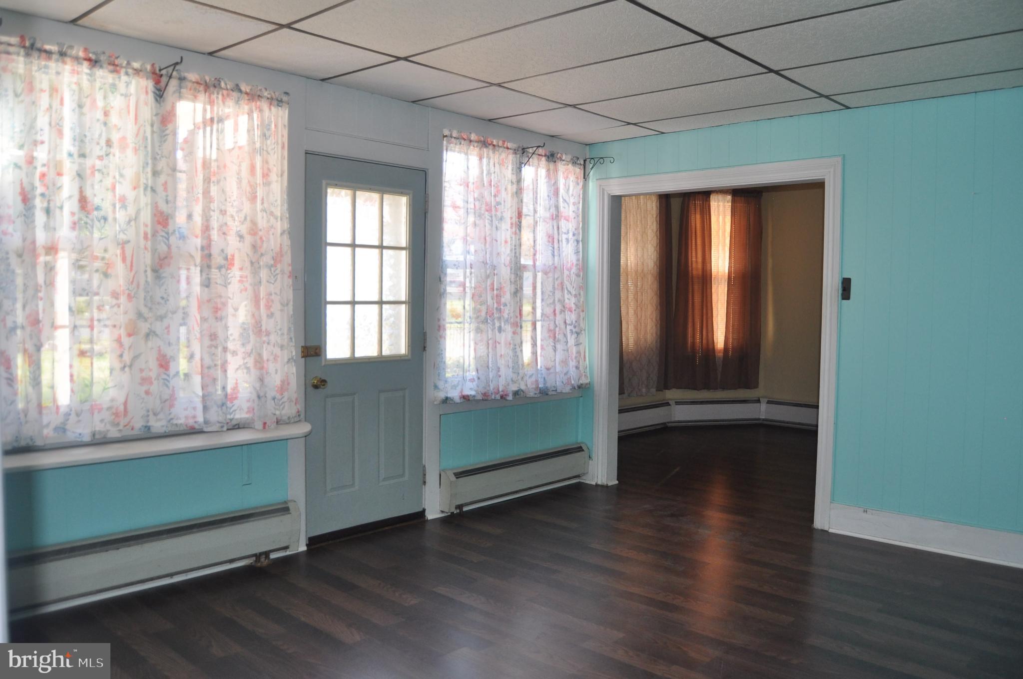 540 South 2nd Street Lykens, PA 17048 - Photo 11 of 42 a room with window and wooden floor