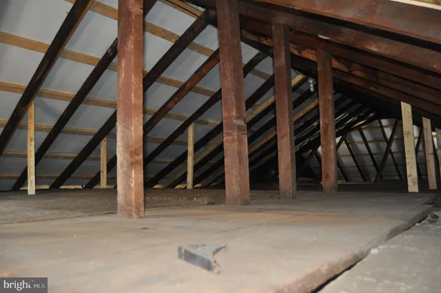 a view of an empty room with stairs