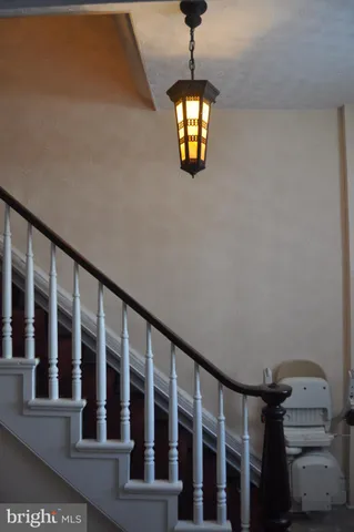 a view of a porch with wooden floor