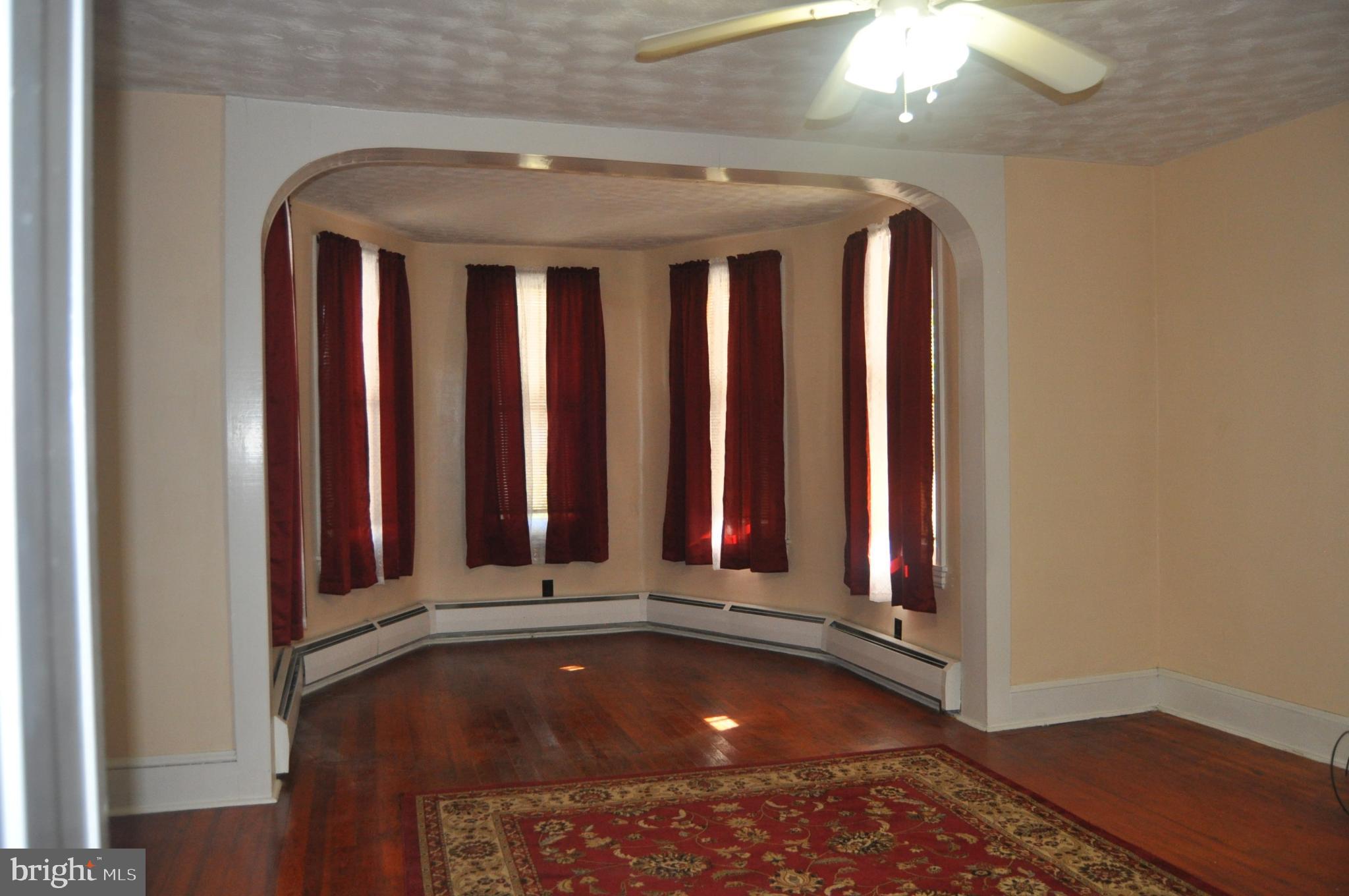 540 South 2nd Street Lykens, PA 17048 - Photo 9 of 42 a view of water heater room with two windows