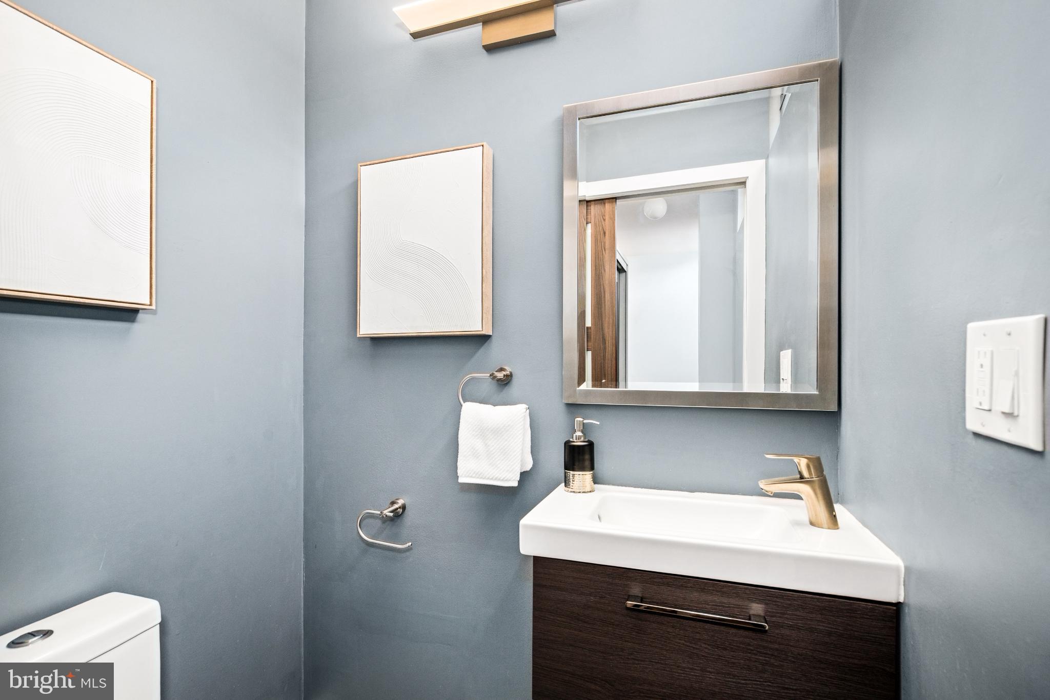 345 O Street Southwest Washington, DC 20024 - Photo 15 of 50 Sleek modern bathroom with stylish accents.