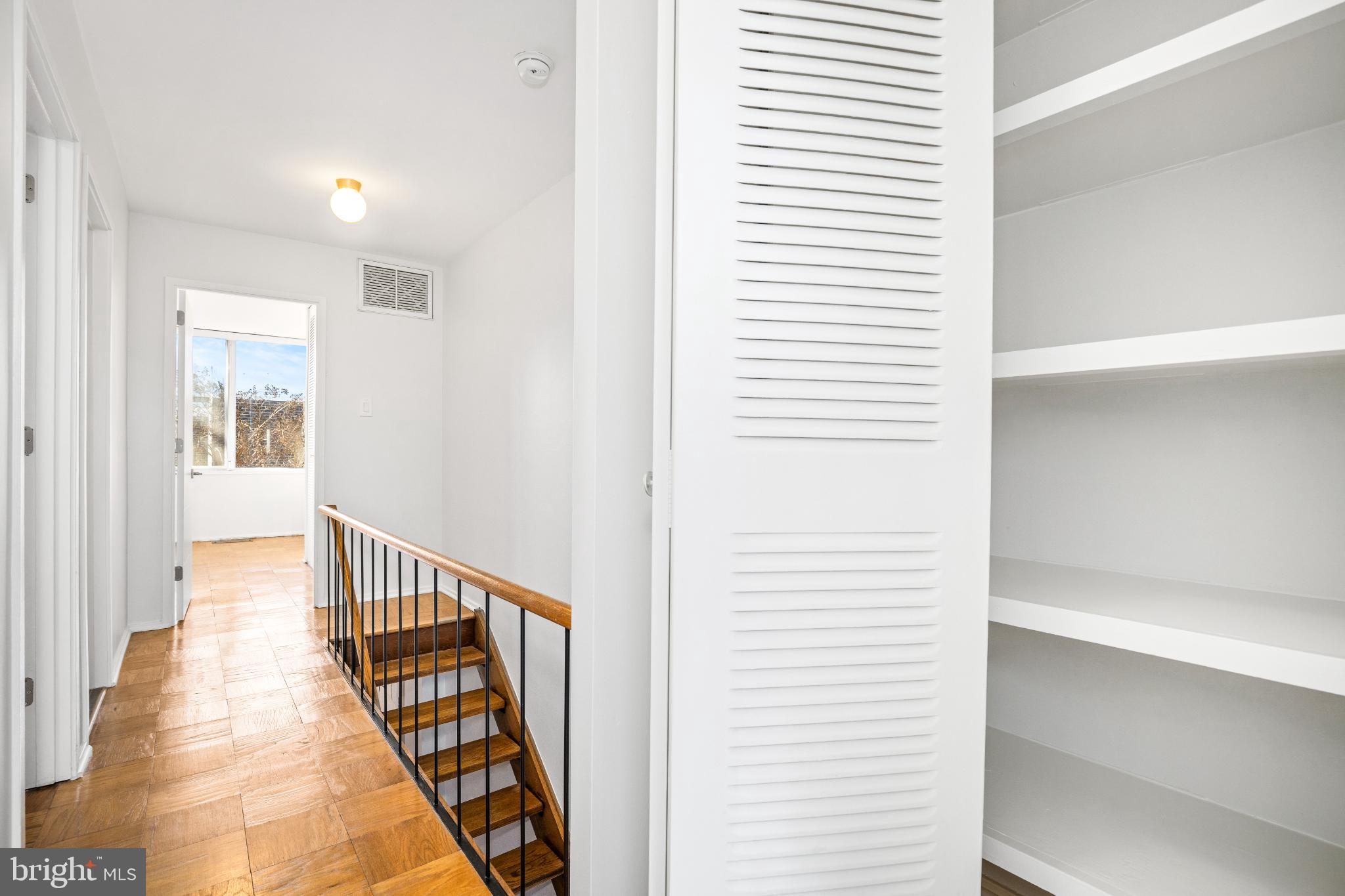 345 O Street Southwest Washington, DC 20024 - Photo 30 of 50 Bright and airy hallway with elegant stairs.