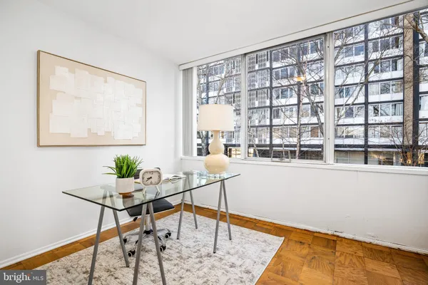 a living room with furniture and window