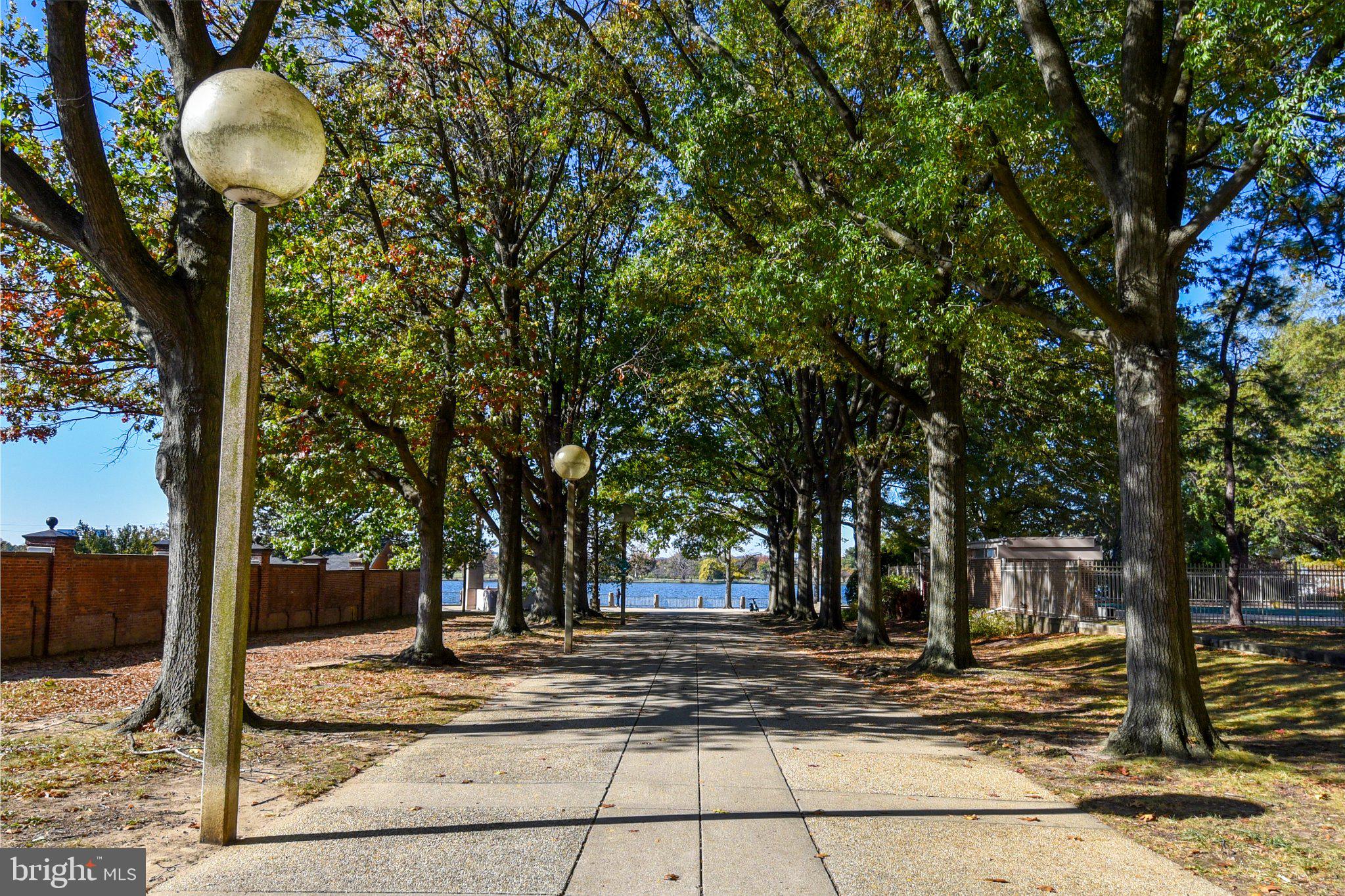 345 O Street Southwest Washington, DC 20024 - Photo 42 of 64 Serene pathway by the water's edge.