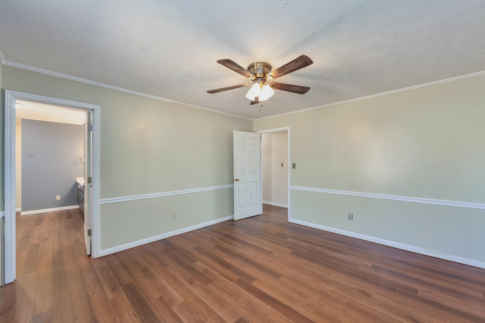 6675 Highway 100 Reagan, TN 38368 - Photo 13 of 32 a view of an empty room with wooden floor