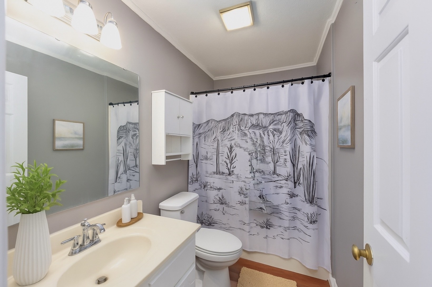 6675 Highway 100 Reagan, TN 38368 - Photo 17 of 32 a bathroom with a sink toilet and shower