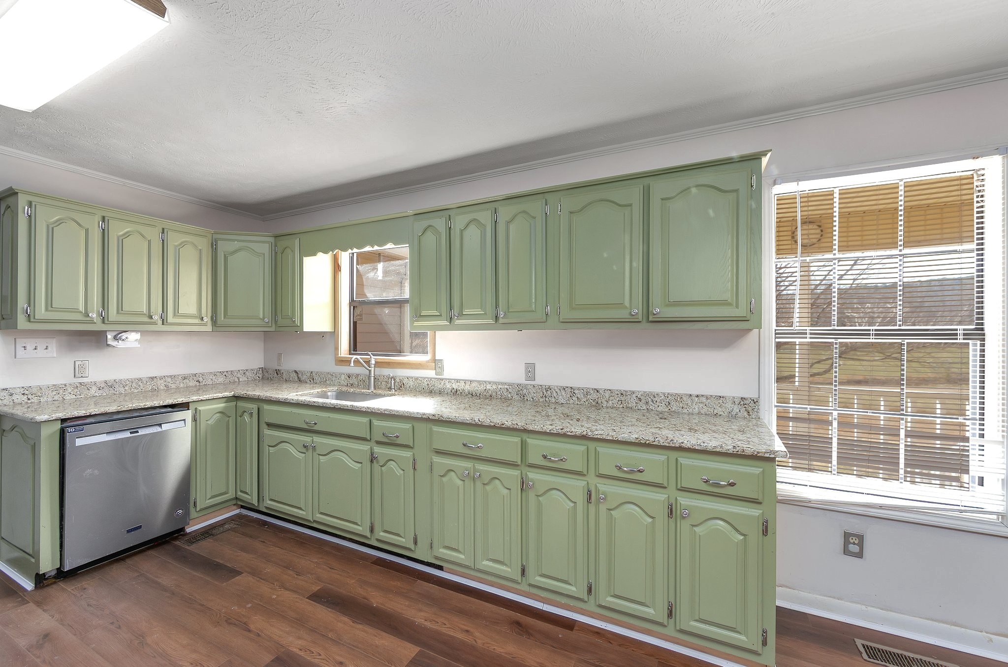 6675 Highway 100 Reagan, TN 38368 - Photo 7 of 32 a kitchen with sink and cabinets