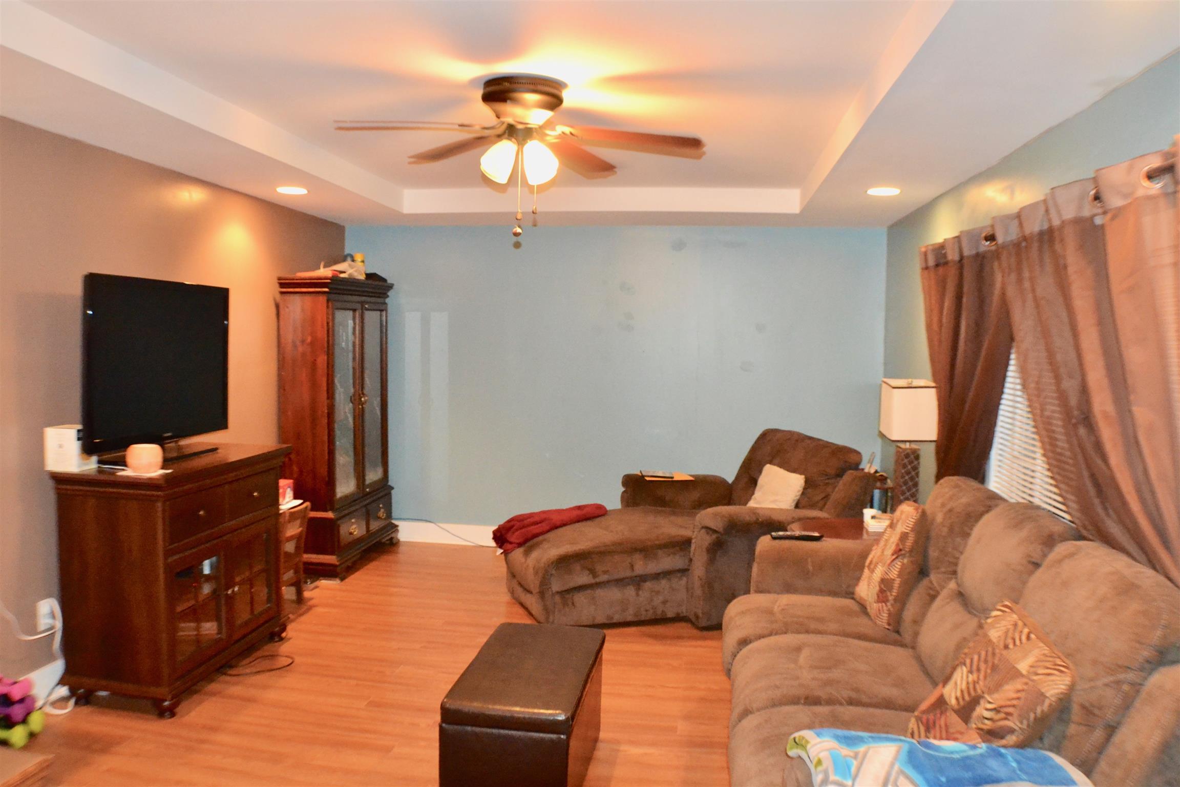 265 Old Temperance Hall Road Liberty, TN 37095 - Photo 2 of 15 a living room with furniture and a flat screen tv