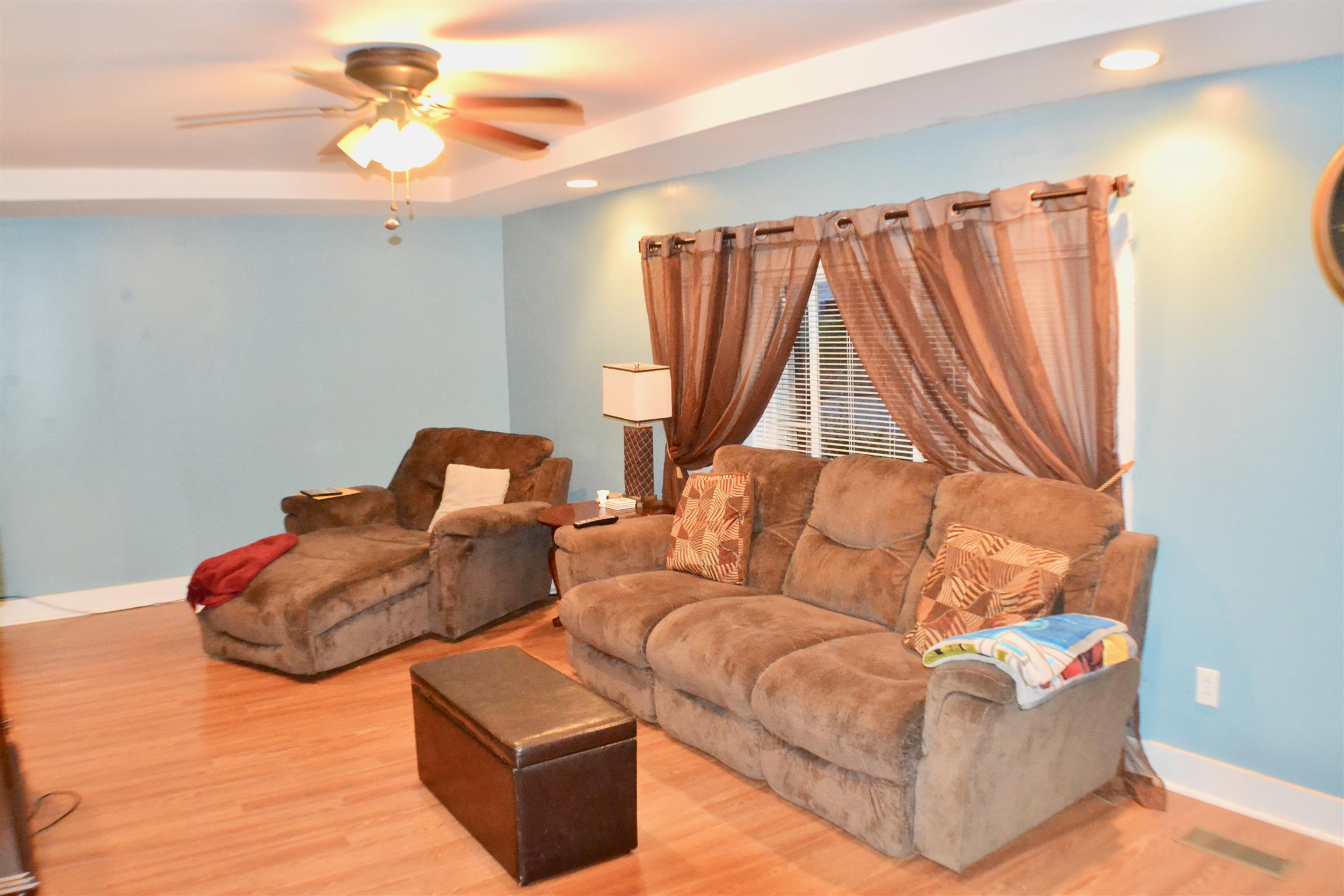 265 Old Temperance Hall Road Liberty, TN 37095 - Photo 3 of 15 a living room with furniture and a chandelier