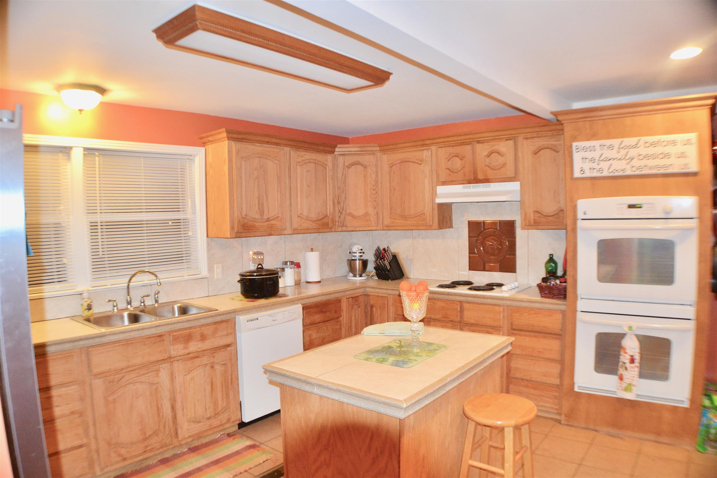 265 Old Temperance Hall Road Liberty, TN 37095 - Photo 5 of 15 a kitchen with stainless steel appliances granite countertop a sink stove and refrigerator