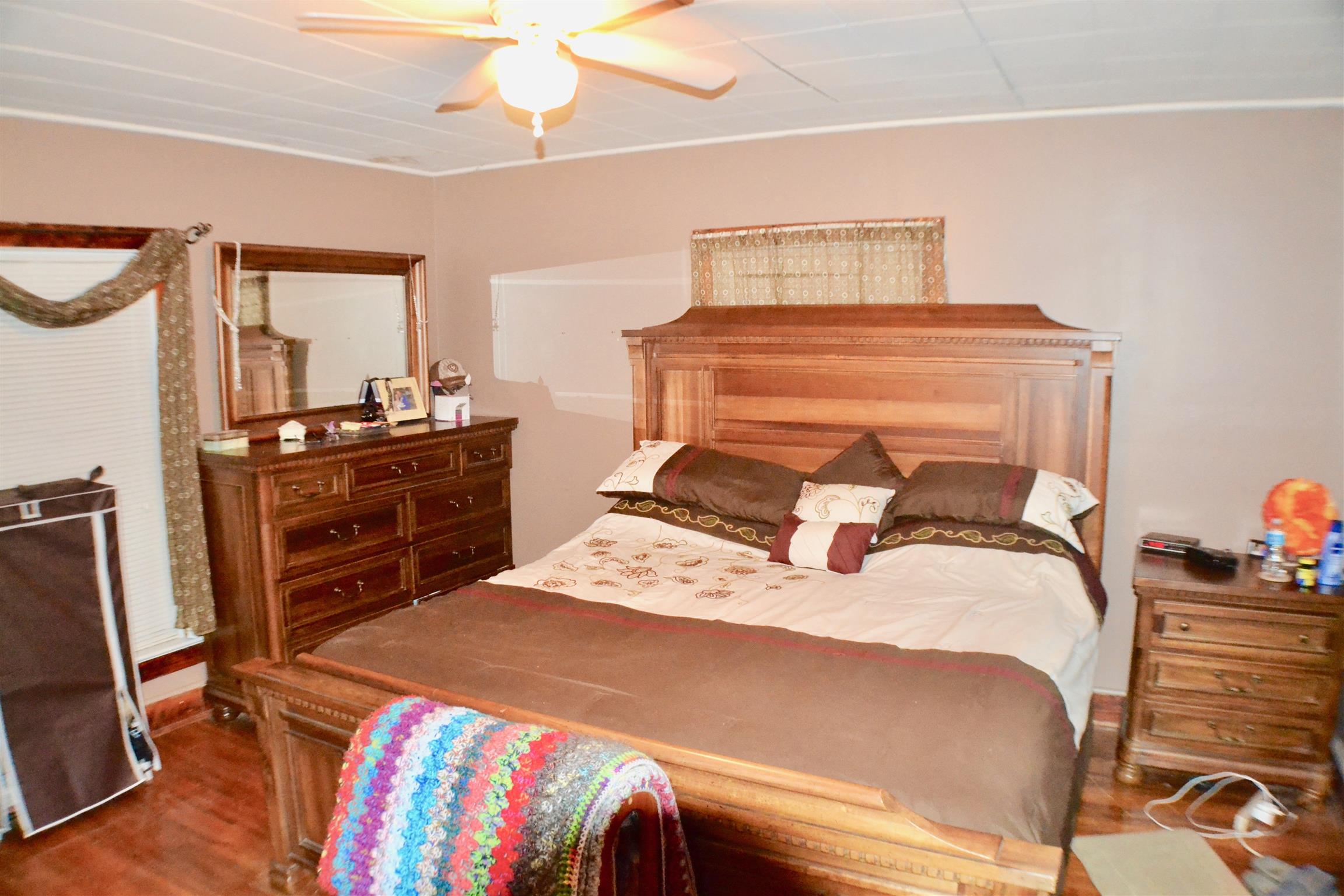 265 Old Temperance Hall Road Liberty, TN 37095 - Photo 9 of 15 a bedroom with a bed and a television