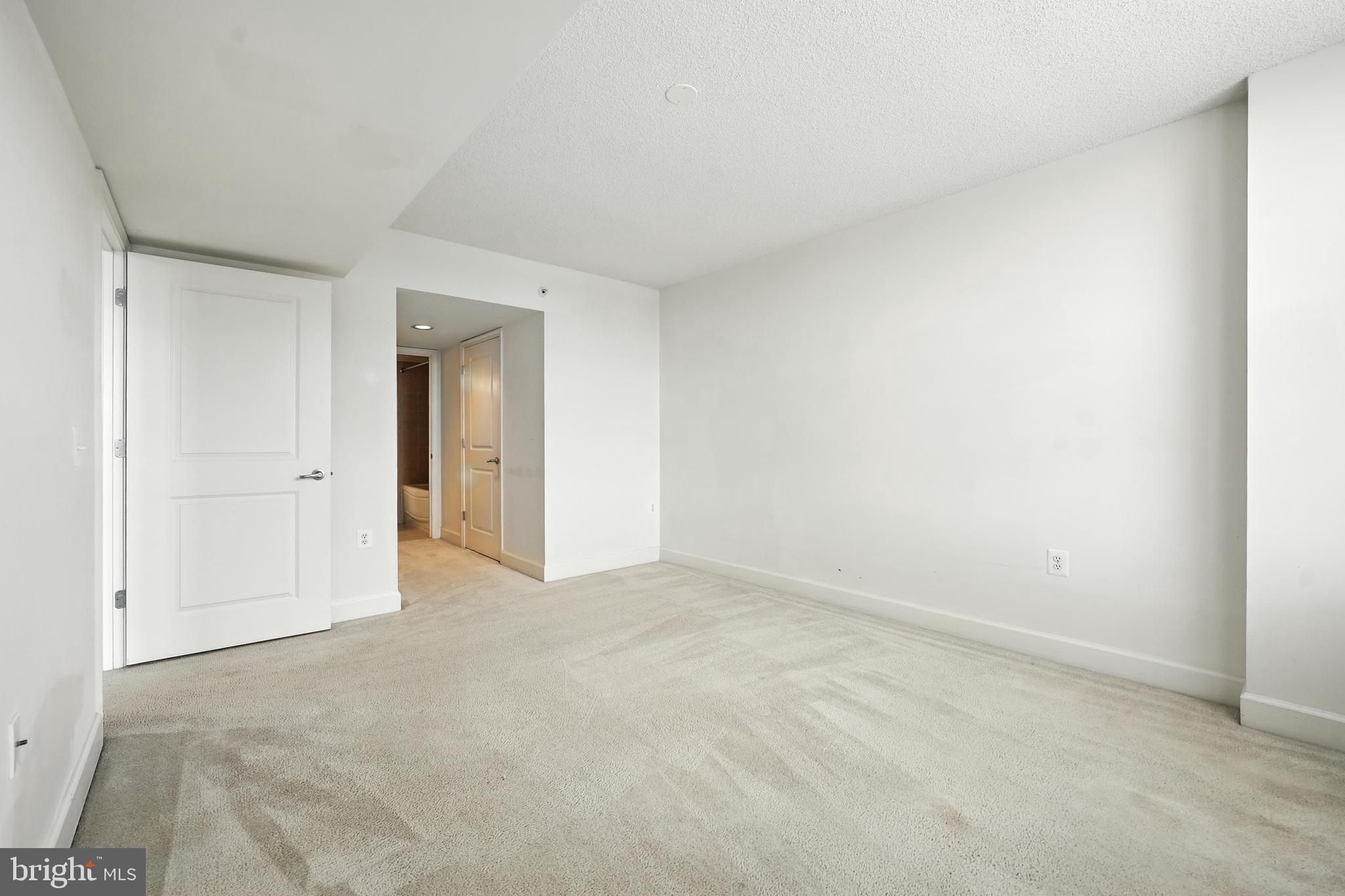 11800 Sunset Hills Road, Unit 818 Reston, VA 20190 - Photo 16 of 26 a view of an empty room and closet