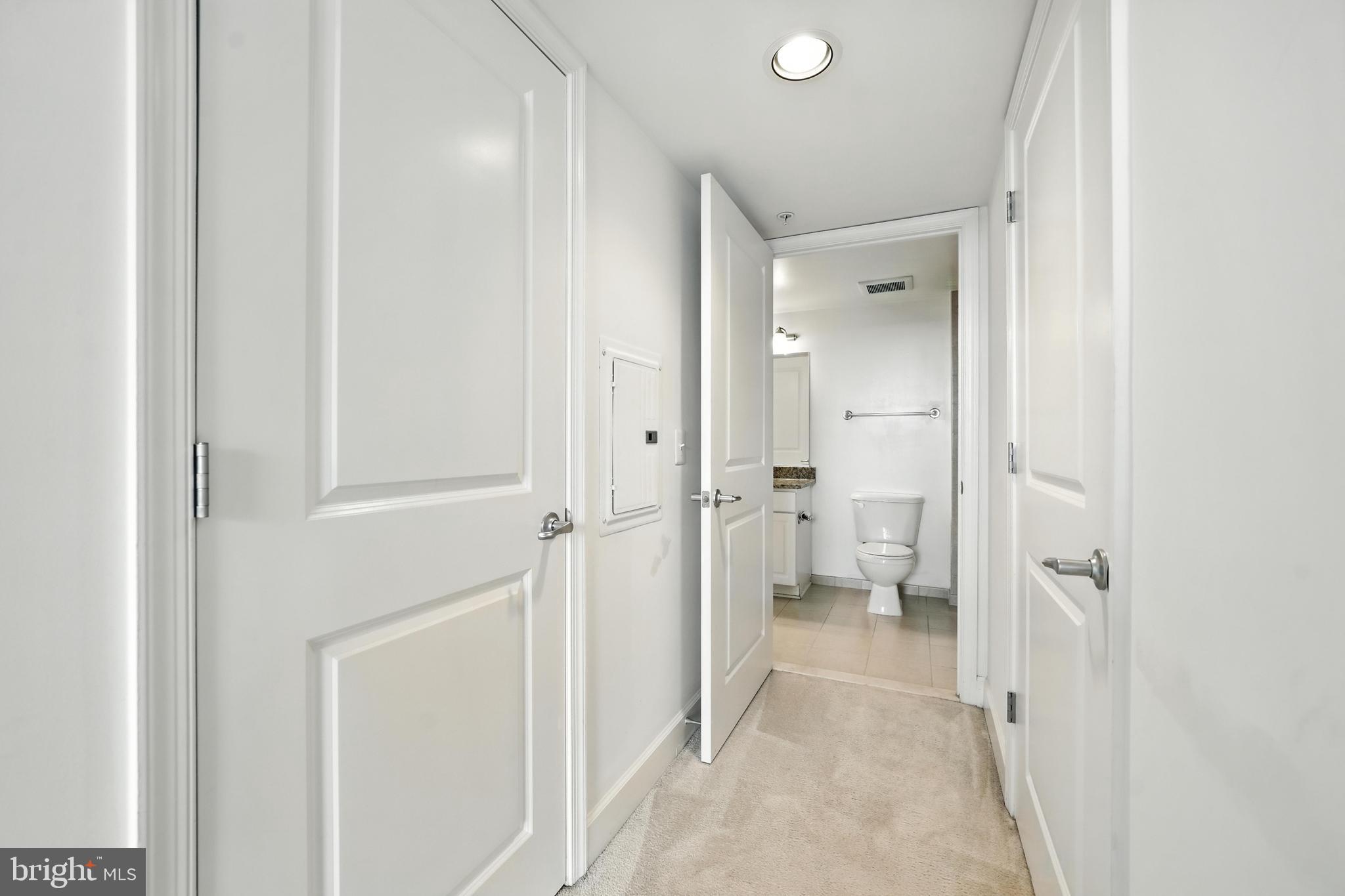 11800 Sunset Hills Road, Unit 818 Reston, VA 20190 - Photo 17 of 26 a view of a bathroom with toilet a bathroom and a shower