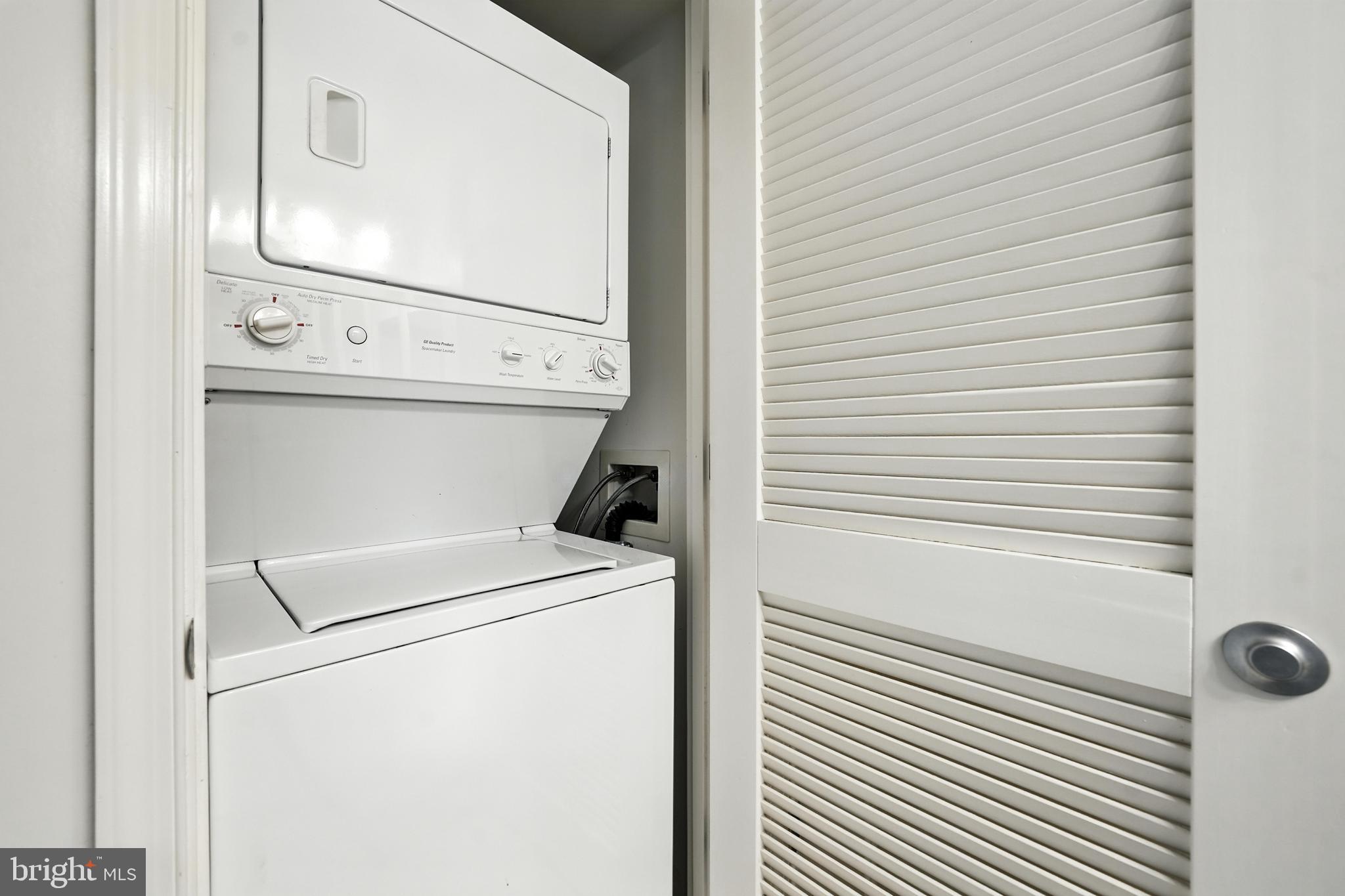 11800 Sunset Hills Road, Unit 818 Reston, VA 20190 - Photo 19 of 26 a close up view of a washer and dryer